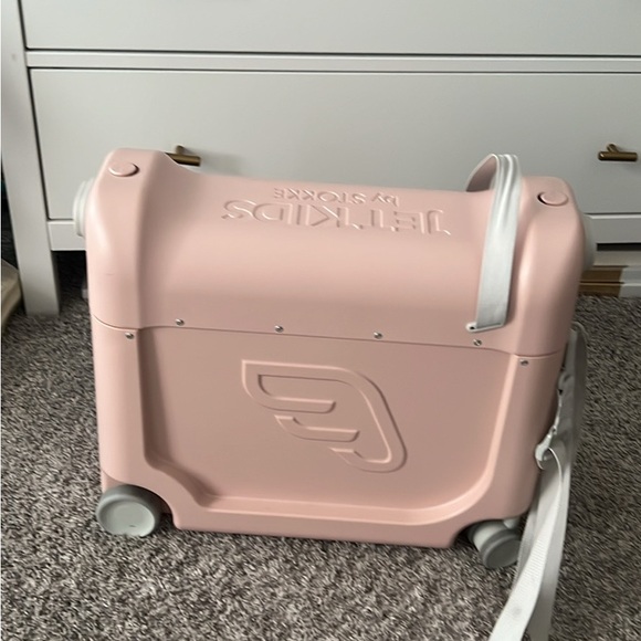 JetKids by Stokke Pink Ride-On Suitcase - Picture 1 of 4